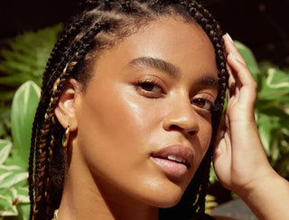 Even, luminous skin in warm daylight, illustrating Skin-Nomad's guide to laser aftercare